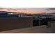 Beautiful city views at dusk, showcasing the vibrant cityscape and distant mountains at 881 Barrhead Ave, Henderson, NV 89012
