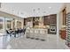 Spacious kitchen with a large island, stainless steel appliances, and ample cabinet space at 881 Barrhead Ave, Henderson, NV 89012