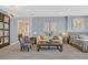 Open living space with modern furniture and access to a luxurious bathroom for a comfortable and elegant feel at 881 Barrhead Ave, Henderson, NV 89012