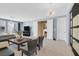 Expansive main bedroom with sitting area, french doors, and modern chandelier at 881 Barrhead Ave, Henderson, NV 89012