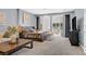 Spacious main bedroom featuring a large bed, stylish decor, and balcony access for relaxation and enjoyment at 881 Barrhead Ave, Henderson, NV 89012