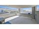 A covered outdoor patio providing views of the surrounding landscape at 881 Barrhead Ave, Henderson, NV 89012