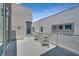 An outdoor patio space with stylish seating, perfect for entertaining or relaxing outside at 881 Barrhead Ave, Henderson, NV 89012