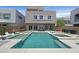 The backyard features a modern swimming pool and spa, ideal for outdoor enjoyment at 881 Barrhead Ave, Henderson, NV 89012