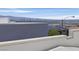A panoramic view capturing the city skyline and distant mountains from a rooftop at 881 Barrhead Ave, Henderson, NV 89012