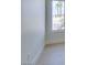 Bedroom corner with hardwood floors and a window with palm tree view at 9425 Villa Ridge Dr, Las Vegas, NV 89134
