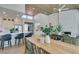 Bright open-concept dining room connected to the kitchen features stylish decor and natural light at 9425 Villa Ridge Dr, Las Vegas, NV 89134
