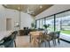 Bright dining room features a decorative hutch, views of the golf course, and open floor plan at 9425 Villa Ridge Dr, Las Vegas, NV 89134