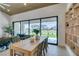 Bright dining room features a decorative hutch and views of the golf course at 9425 Villa Ridge Dr, Las Vegas, NV 89134