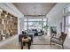 Bright living room with fireplace, stylish shelving, and an abundance of natural light at 9425 Villa Ridge Dr, Las Vegas, NV 89134