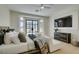 Bright main bedroom with scenic golf course views and comfortable seating area at 9425 Villa Ridge Dr, Las Vegas, NV 89134