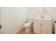 Bathroom featuring modern fixtures, toilet, and vanity with sink at 9545 Parker Springs Ct, Las Vegas, NV 89166