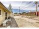Large backyard with rock landscaping, brick pavers, a concrete slab and a bench at 1012 Winwood St, Las Vegas, NV 89108