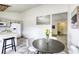 Bright eat-in kitchen with breakfast bar and access to other rooms at 1012 Winwood St, Las Vegas, NV 89108