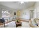 Bright living room with vaulted ceiling and views of the front yard at 1012 Winwood St, Las Vegas, NV 89108