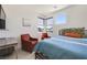 Comfortable bedroom with large windows and stylish furnishings, offering a relaxing space at 10297 Sierra Skye Ave, Las Vegas, NV 89166