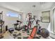 Well-equipped home gym with various exercise machines and equipment for a complete workout at 10297 Sierra Skye Ave, Las Vegas, NV 89166