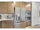 Contemporary kitchen with stainless steel appliances and sleek cabinetry providing efficient storage solutions at 10297 Sierra Skye Ave, Las Vegas, NV 89166