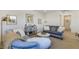 Cozy living room with comfortable sofas, stylish decor, and plenty of natural light at 10297 Sierra Skye Ave, Las Vegas, NV 89166
