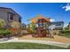 Neighborhood playground with climbing structures, a slide, shade and seating for families to enjoy at 10297 Sierra Skye Ave, Las Vegas, NV 89166