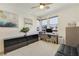 Functional home office with a desk, modern decor, and a comfortable seating area at 10297 Sierra Skye Ave, Las Vegas, NV 89166