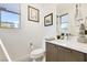 Stylish powder room with modern fixtures, elegant decor, and ample natural light at 10297 Sierra Skye Ave, Las Vegas, NV 89166