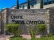 Stone monument sign reading Onyx at Skye Canyon, surrounded by shrubbery at 10297 Sierra Skye Ave, Las Vegas, NV 89166