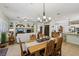Combined living and dining areas featuring tile floors and warm tones, ideal for Gathering gatherings at 10404 Stanberry Ave, Las Vegas, NV 89135