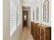Bright hallway with natural light and decorative cabinets at 10404 Stanberry Ave, Las Vegas, NV 89135