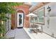 Charming outdoor patio featuring a cozy seating area, perfect for relaxing or entertaining guests at 10404 Stanberry Ave, Las Vegas, NV 89135