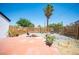 Spacious backyard with a concrete patio area perfect for entertaining and relaxing, along with a modern fence at 108 Verdy Ln, Las Vegas, NV 89101