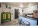 Bright kitchen with white cabinets, stainless steel appliances and island with seating at 108 Verdy Ln, Las Vegas, NV 89101