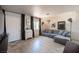 Comfortable living room showcases sleek floors, neutral tones, contemporary decor, and lots of light at 108 Verdy Ln, Las Vegas, NV 89101
