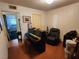 Versatile bonus room with tile flooring, suitable for a home office or entertainment area at 109 Prince Ln, Las Vegas, NV 89110