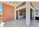 Outdoor balcony with sliding glass doors leading into a bright living space at 10985 Limeslice Ave # 2, Las Vegas, NV 89135
