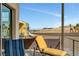 This balcony offers a relaxing view of the arid hillsides surrounding the community at 10985 Limeslice Ave # 2, Las Vegas, NV 89135