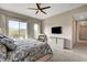 Spacious bedroom features floor to ceiling windows offering lots of natural light and great views at 10985 Limeslice Ave # 2, Las Vegas, NV 89135