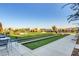 Community bocce ball court and seating area with a beautiful view at 10985 Limeslice Ave # 2, Las Vegas, NV 89135