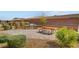 Outdoor community space with a picnic table and grilling area perfect for neighborhood socializing at 10985 Limeslice Ave # 2, Las Vegas, NV 89135