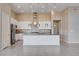 Modern kitchen with stainless steel appliances, granite countertops, and tiled backsplash at 10985 Limeslice Ave # 2, Las Vegas, NV 89135