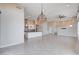Open floor plan featuring tile floors, recessed lighting, modern light fixture, and living space at 10985 Limeslice Ave # 2, Las Vegas, NV 89135