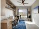 Home office space with built-in shelving and desk, offering a functional and organized work environment at 10985 Limeslice Ave # 2, Las Vegas, NV 89135