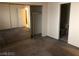 Bedroom featuring mirror closet doors and doorway to bathroom at 1105 Sulphur Springs Ln # 102, Las Vegas, NV 89128