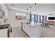Well-equipped kitchen with stainless appliances, sleek countertops, and an open view to the living area at 1321 Hudson Creek Pl, North Las Vegas, NV 89084