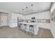Beautiful kitchen features an island, stainless steel appliances, and plenty of cabinet space at 1321 Hudson Creek Pl, North Las Vegas, NV 89084