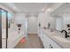 Large main bathroom featuring a soaking tub and double sink vanity at 1321 Hudson Creek Pl, North Las Vegas, NV 89084