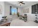 Office space with a desk, chair, decorative plants, and modern decor at 1321 Hudson Creek Pl, North Las Vegas, NV 89084