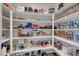 Well-organized walk-in pantry with abundant shelving and ample storage for food and kitchen essentials at 1321 Hudson Creek Pl, North Las Vegas, NV 89084