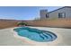 Backyard pool with stone border and plenty of room for entertaining at 1321 Hudson Creek Pl, North Las Vegas, NV 89084