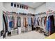 Spacious walk-in closet provides ample storage space, organized shelving, and a window at 1321 Hudson Creek Pl, North Las Vegas, NV 89084